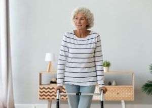 older woman with hearing device